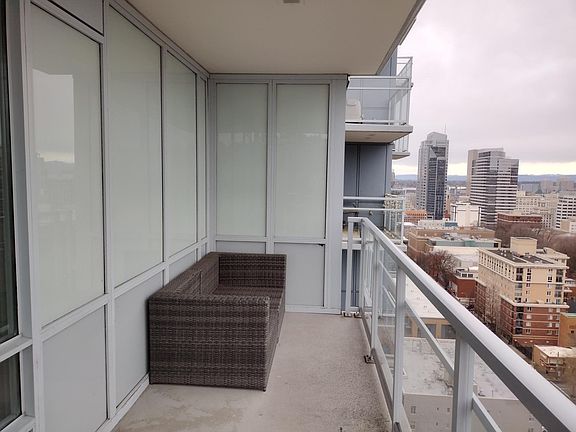 Large deck overlooking city. Enjoy gorgeous sunrises with a cup of coffee.