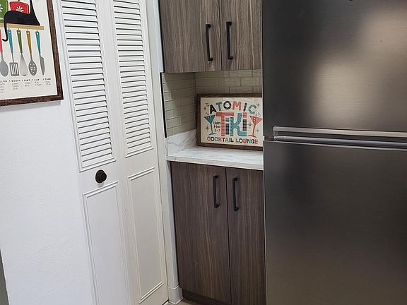 New fridge. Large pantry with loads of storage space.