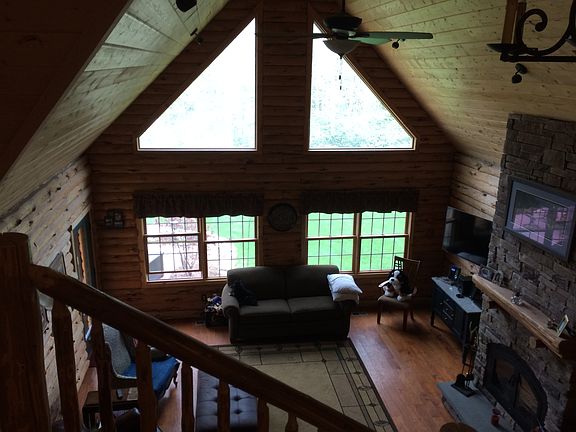 LOFT LOOKING AT LIVING ROOM