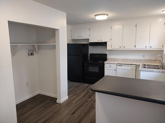 Laundry closet in kitchen