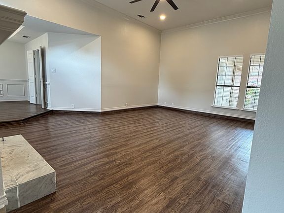 Beautiful Open Floor Plan. Warm Wood Floors and Fresh Paint