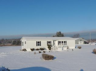 6147 N Maple Hill Rd, Howard City, MI 49329