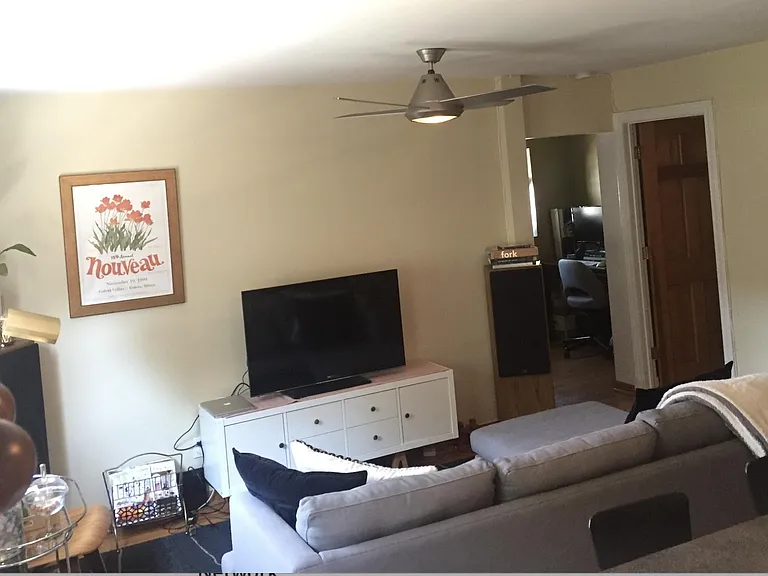Living area has room for a sectional sofa