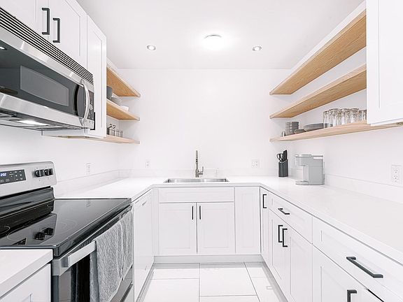 2nd image of 6199 Canterbury Dr Unit 107