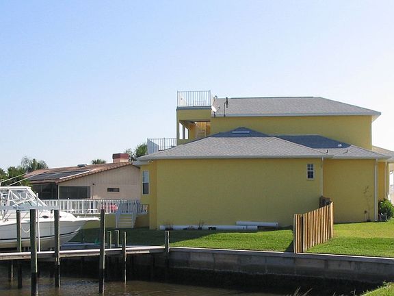 Large Dock Deck and Boat Lift w/ Fenced Parking area for 30' RV recently added