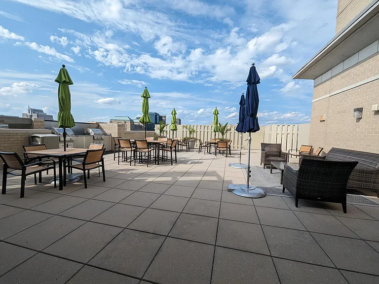 Common Area - Outdoor Grills with patio furniture.