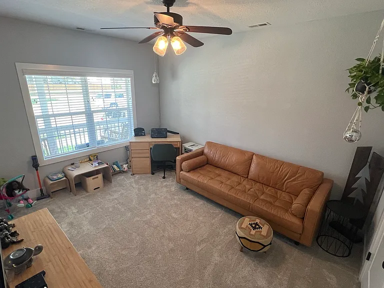 Downstairs bedroom with large double door closet and connecting bathroom