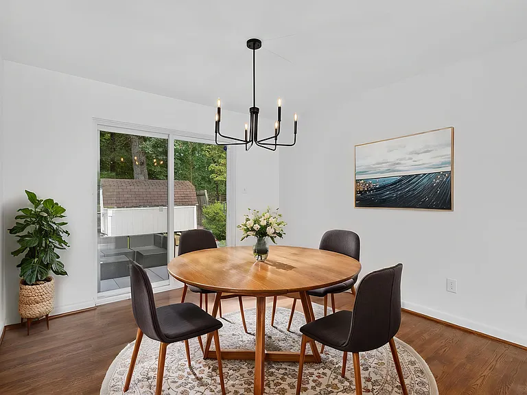 Living room leads to dining area (can easily fit 6 seat table)