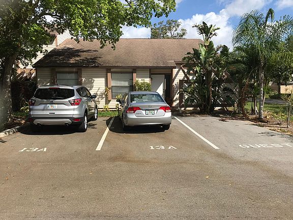 Unit comes with two private parking spaces, and the guest space is just steps to front door.