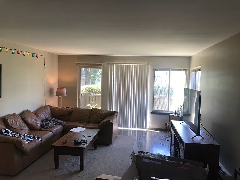 Living room area and access to patio outside space