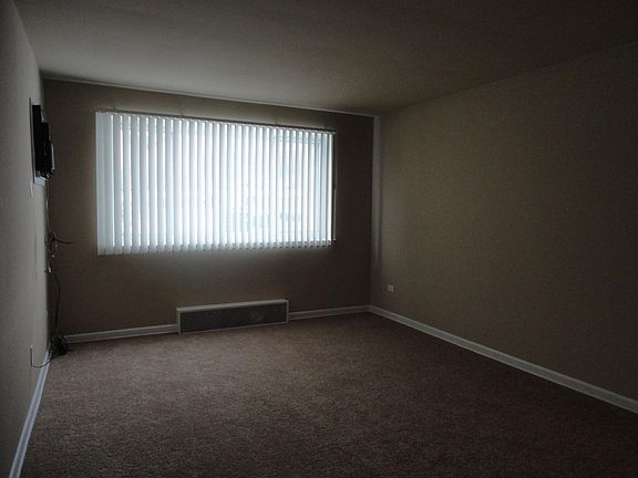 Living room faces South and Ogden Road