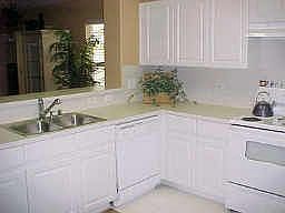 Another view of the Kitchen, dishwasher, double sink & stove