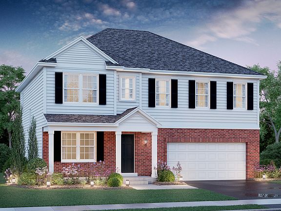 Colton C2 shown with optional covered porch extention and brick