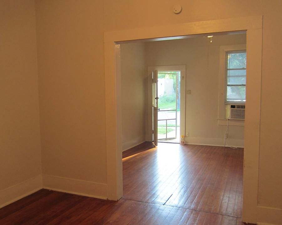 Dining room looking towards living room. Super high ceilings!