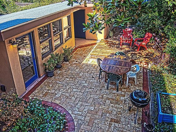 Common outdoor area including a locked laundry room and a locked bike room.