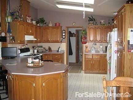 Kitchen
						:
						Spacious cooking area with ample counter/cupboard space