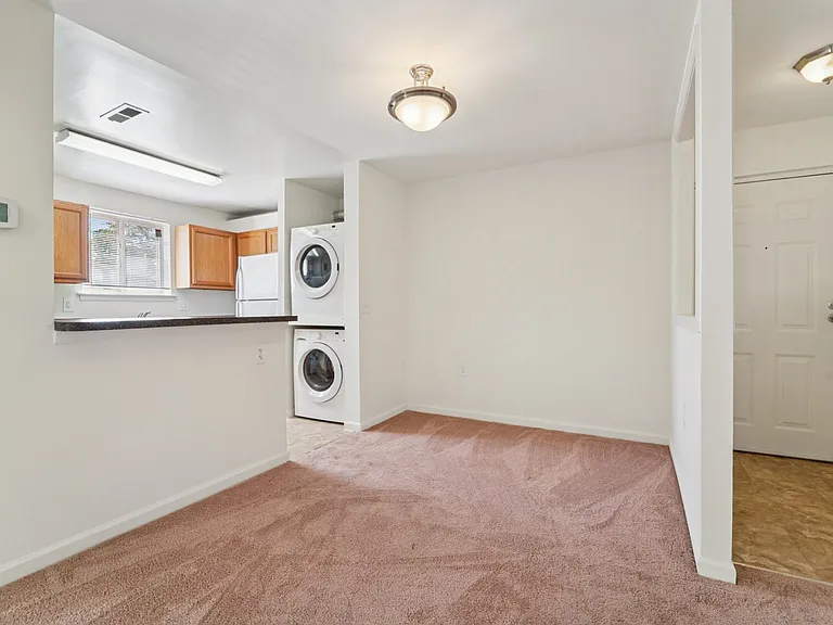 2BR, 1.5BA - 939SF - Vacant - Dining Area and Kitchen