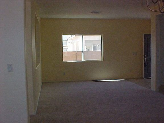 Formal living room + Den downstairs