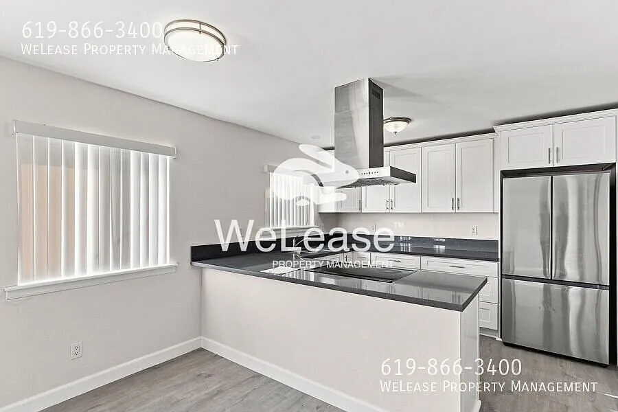 Newly renovated home with on-site laundry room! $1000 Off First Months Rent — Photo 4