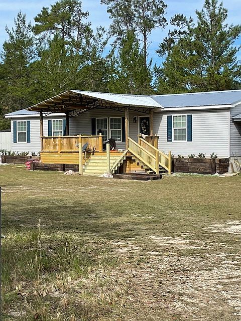 Beautiful front porch is perfect for enjoying morning coffee or evening peaceful time.