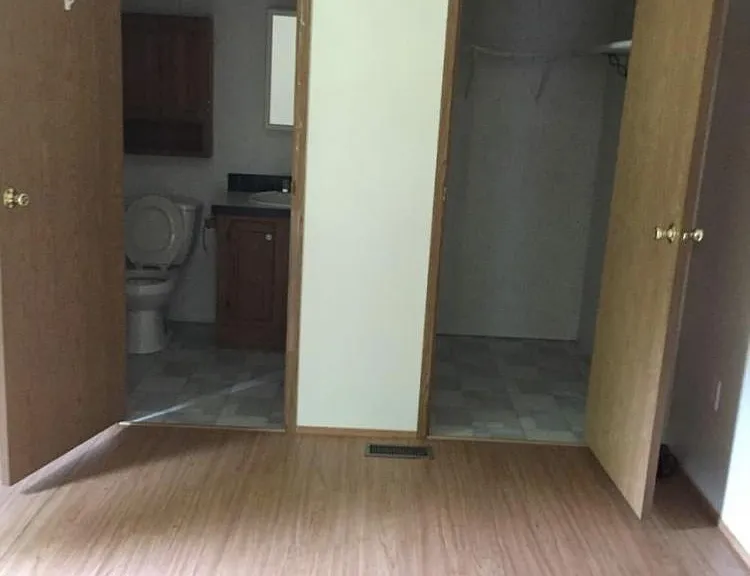 Master bedroom has its owns private full bath with stand up shower and a walk in closet.