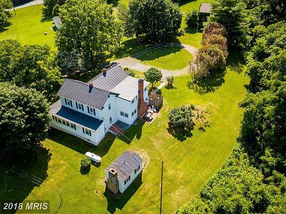 Custom-built c 1907, 70s addition, approx 2 ac