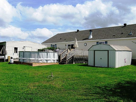 Rear w/sheds & pool