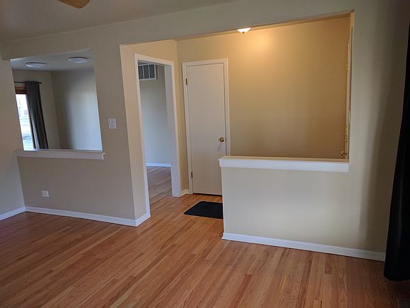 Living (Looking into Foyer and Dining)