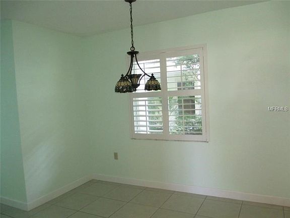 Dining Room with View of Lush Atrium