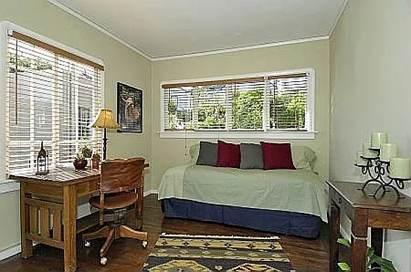 Bedroom with light galore and big closets