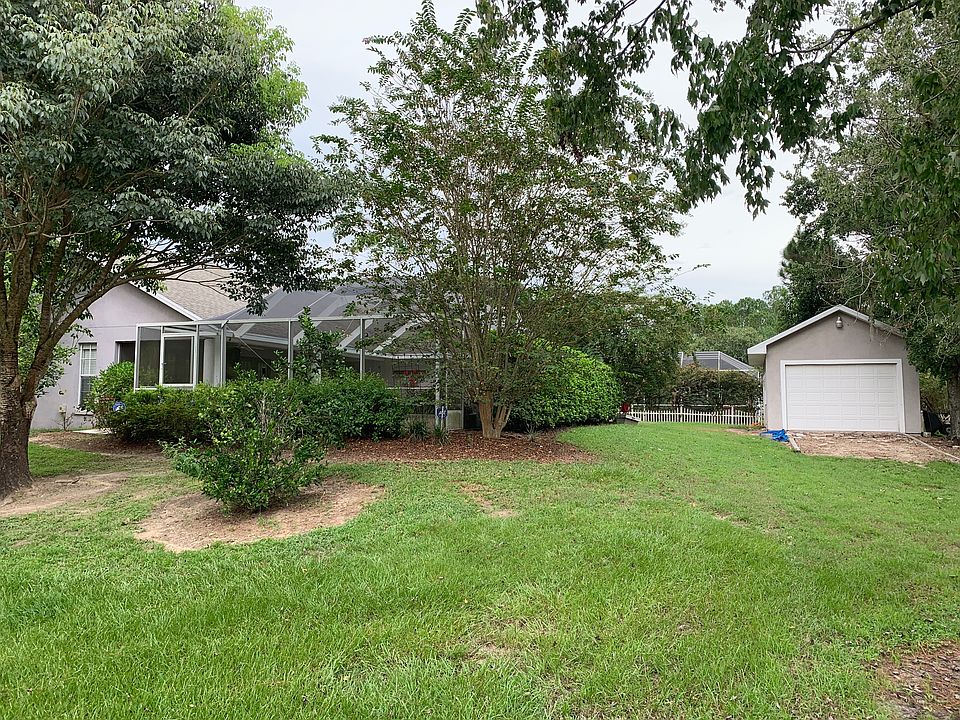 Back yard and pool cage