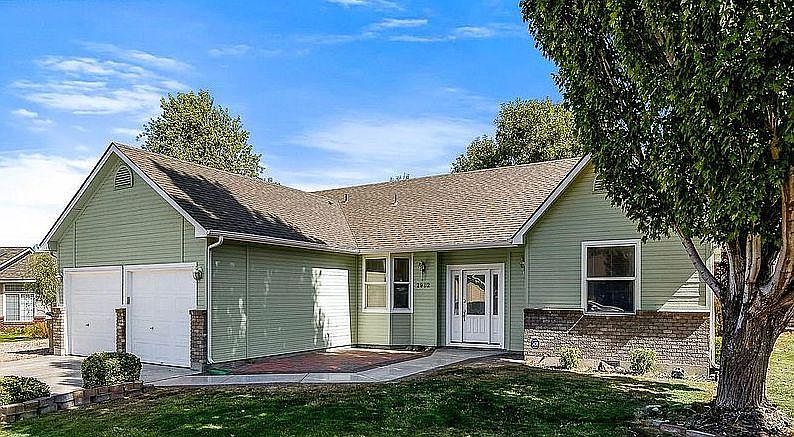Quiet corner lot with outside patio sitting area