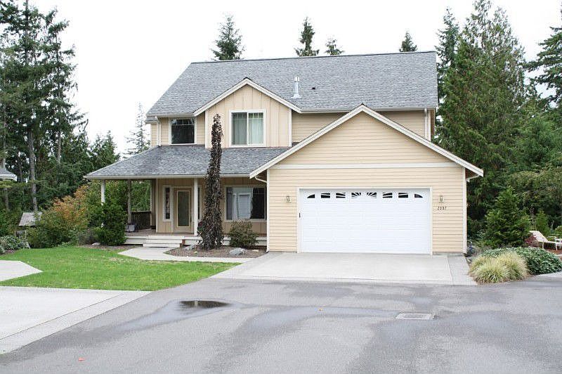 Welcome Home! Nice welcoming wrap around covered front porch.