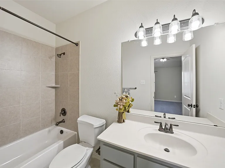 Bedroom 3 upstairs with its own ensuite bath
