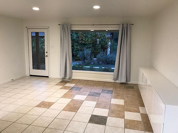 Living room with built in cabinet.
