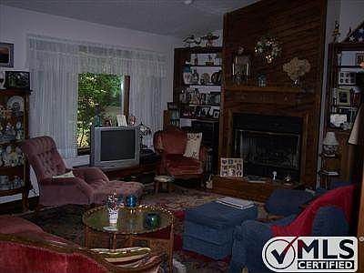 Living Room with Large Picture window overlooking the back yard.