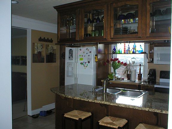 open kitchen to lr, dr and den