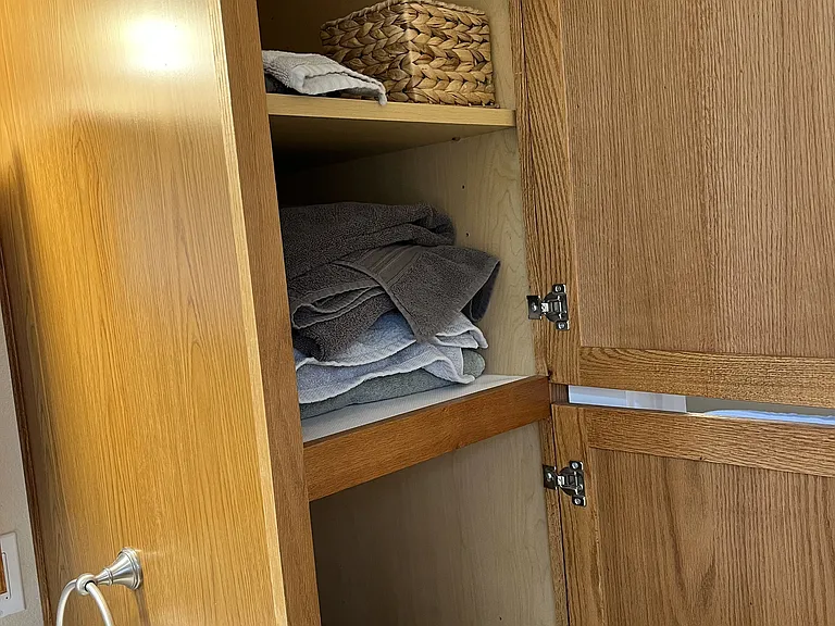 Linen closet in bathroom