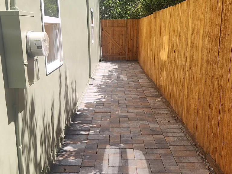 West side-yard walkway facing street