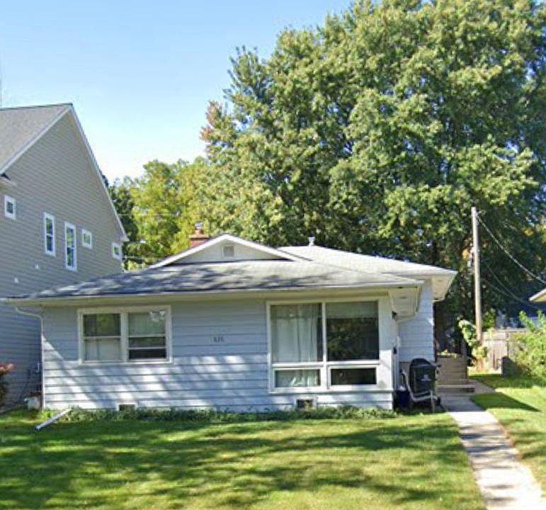 Front of house (stairs on the right of the house is the entrance to this unit)