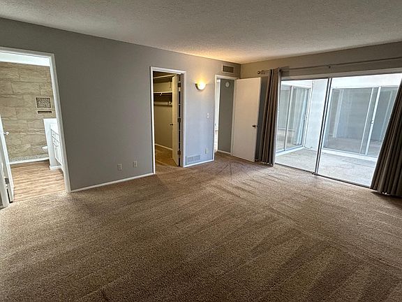 Master bedroom with ensuite (left door) and walkin closet.