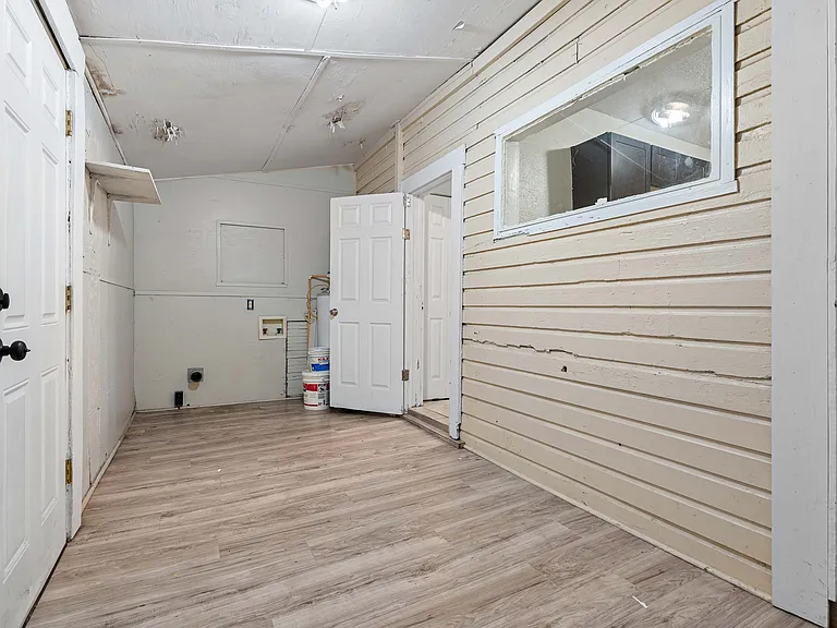 Storage room with washer/dryer connections