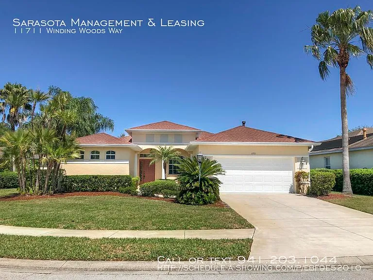 11711 Winding Woods Way — Photo 1