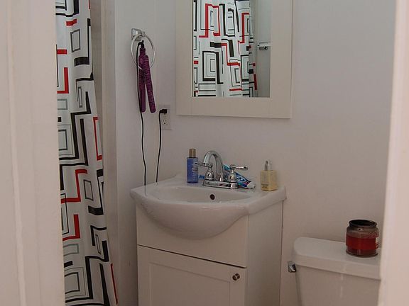 This photo was taken a couple years ago; we have since added a large medicine cabinet above the toilet.