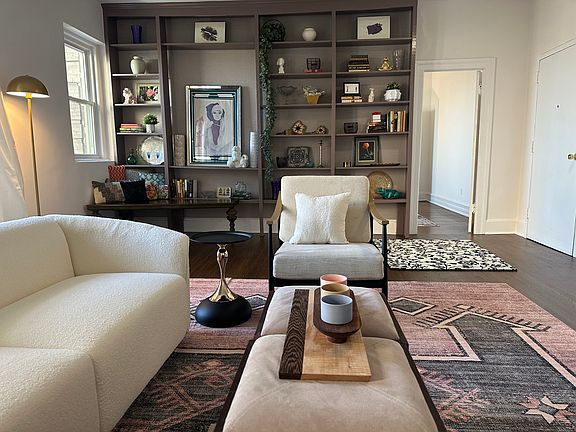 Living room to primary bedroom view.