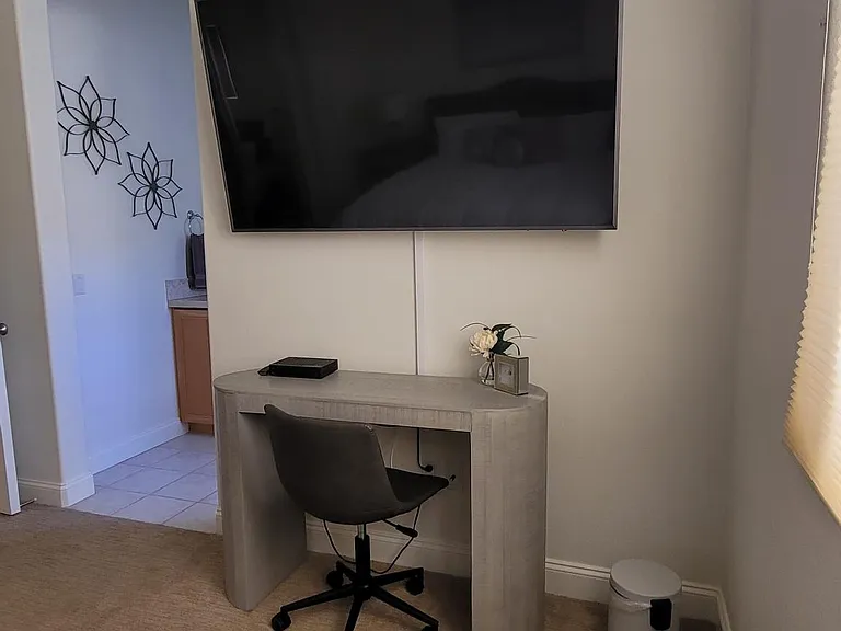 Bedroom 2 - King bed, large closet, desk, large TV, ensuite with shower and bathtub
