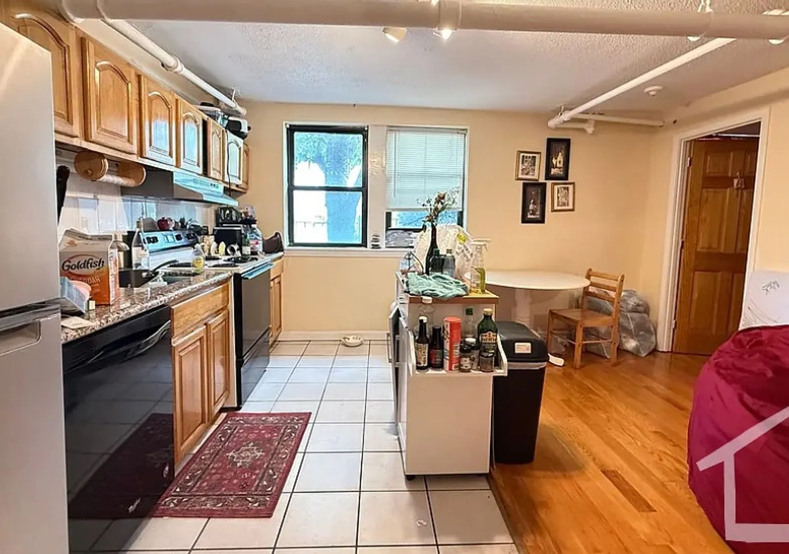 1BR with Heat & Hot Water Included | Steps to the Green Line — Photo 1