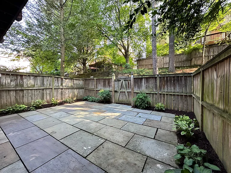 Fenced Backyard with Flagstone Patio
