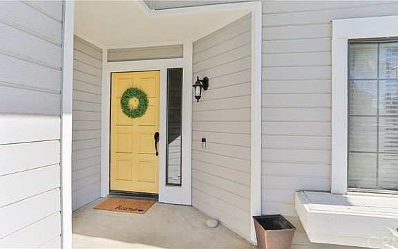 being greeted with a yellow front door makes you happy to come home.