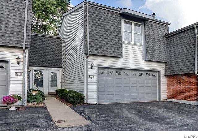 2237 Village Green Parkway a spacious three bedroom two and a half bath townhouse with many updates